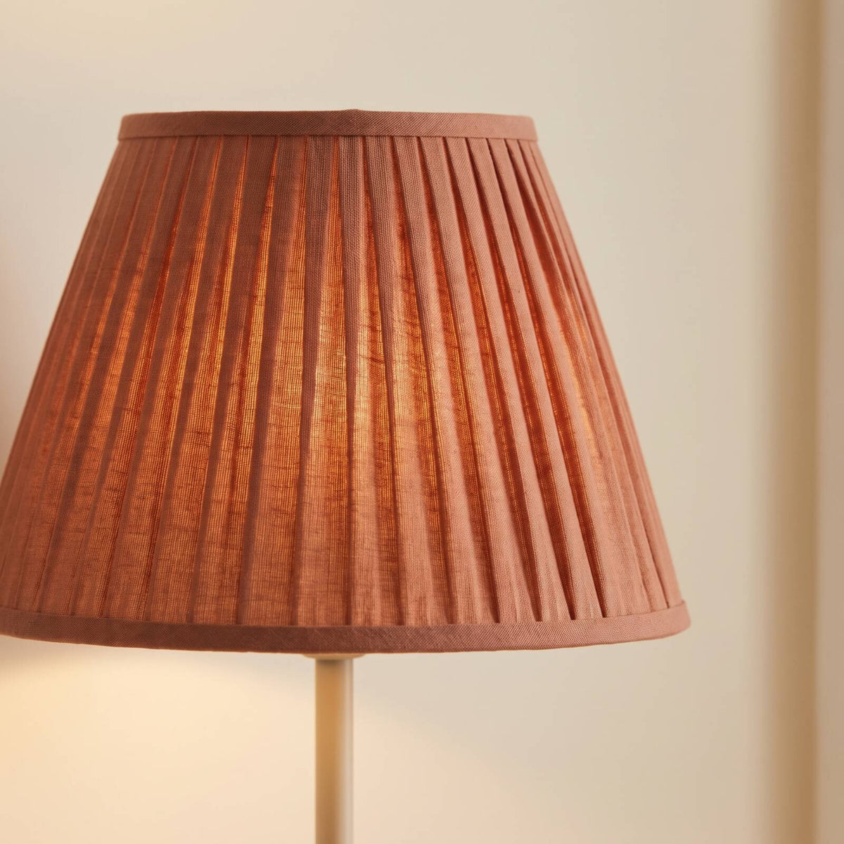 Close-up of the pleated terracotta shade