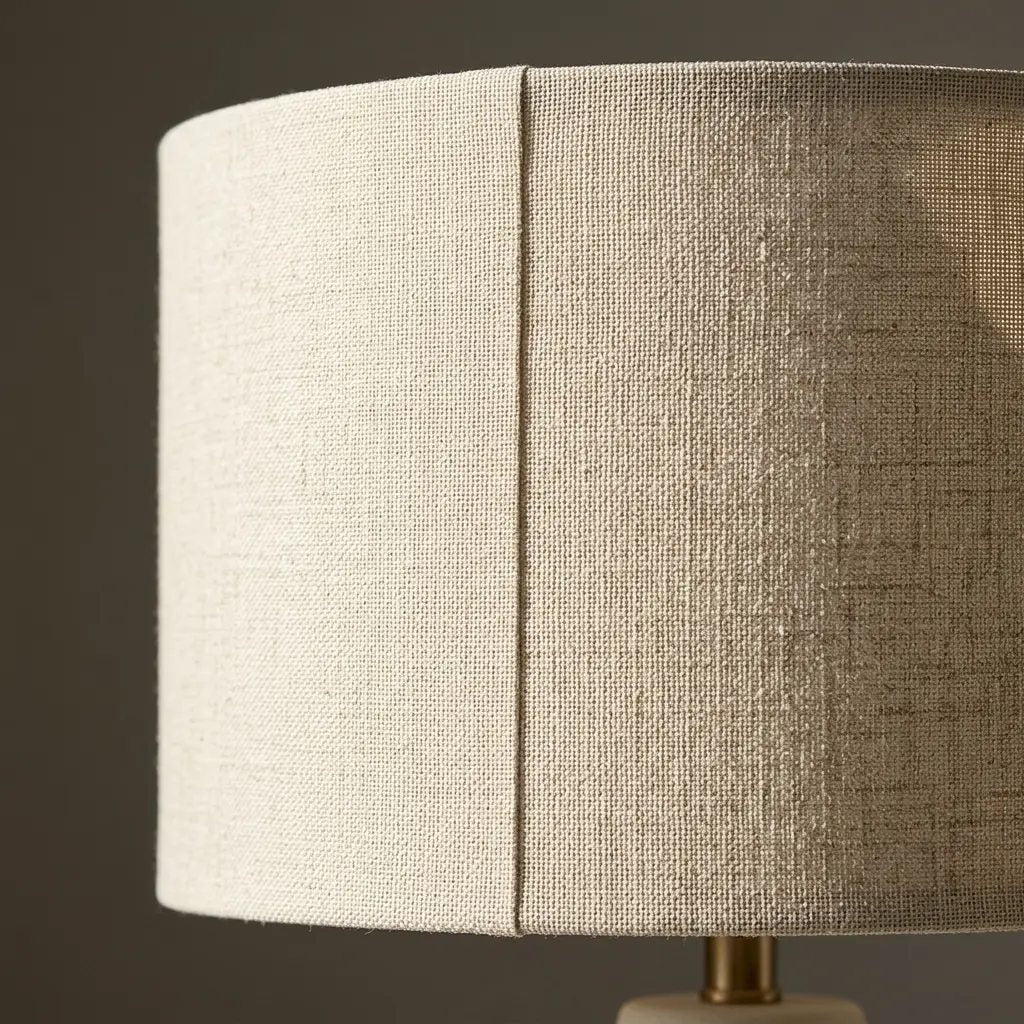 Close-up of the pale cylindrical fabric shade