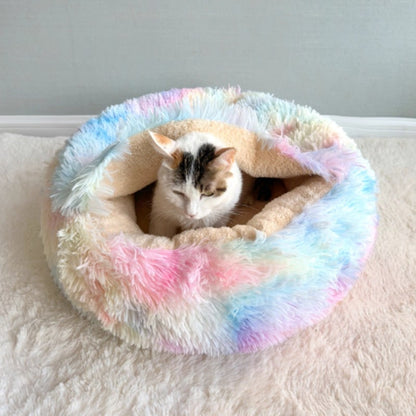 Rainbow plush round pet bed with a cat