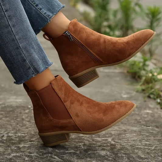 Brown faux suede Chelsea boots worn with jeans