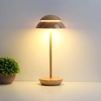 Wood cordless dome table lamp switched on