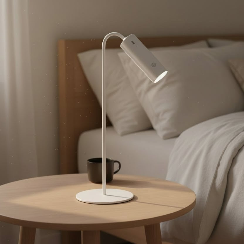 White desk lamp on a bedside table