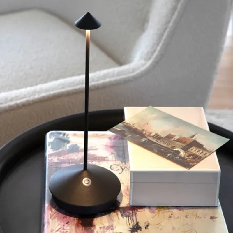 Black lamp on a side table
