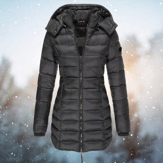 Black fitted hooded puffer jacket for women on a snowy background