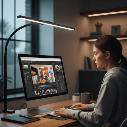 Gooseneck LED desk lamp lighting a home office desk