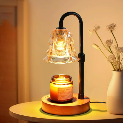 Candle warmer lamp warming a jar candle on a side table