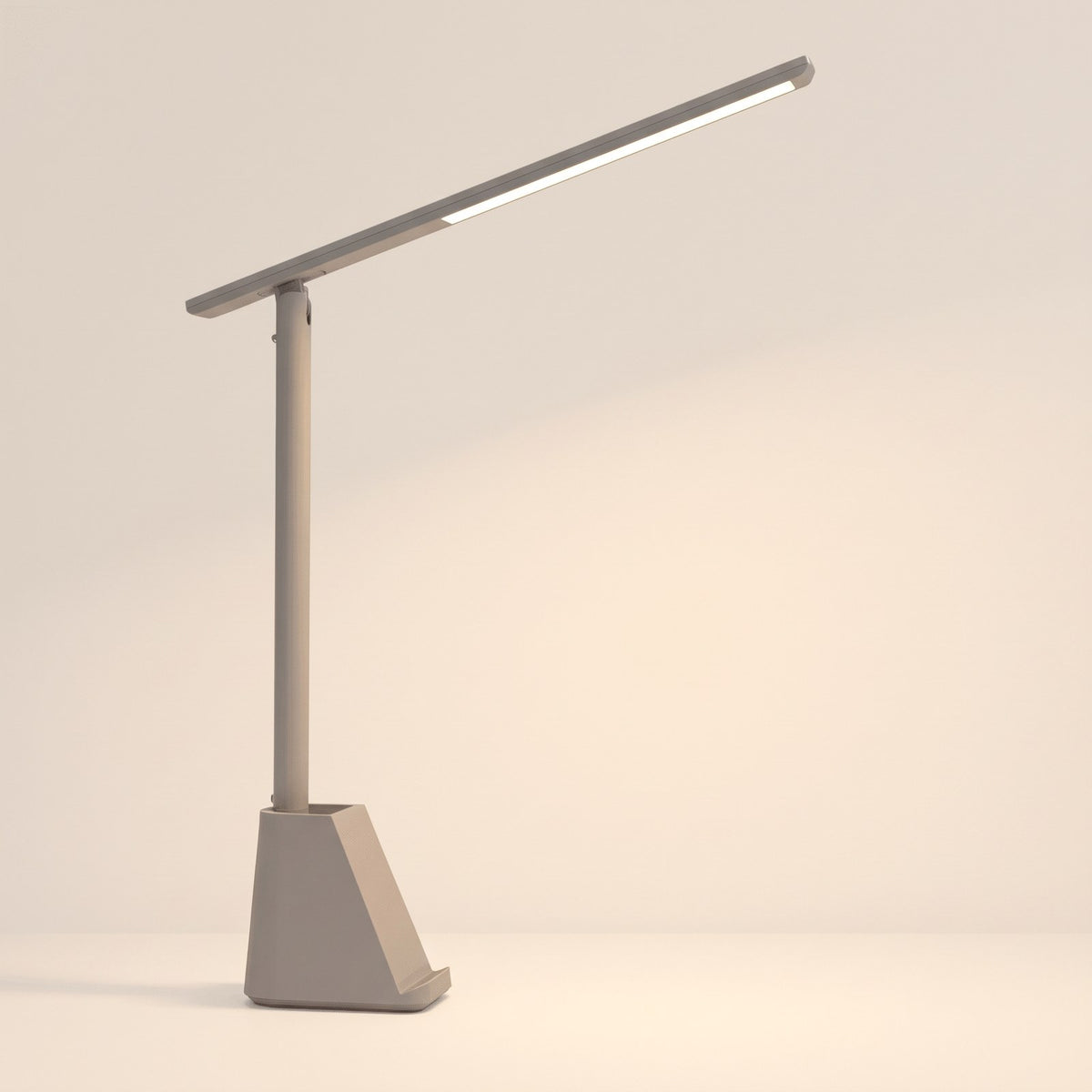 Foldable slim LED desk lamp in grey