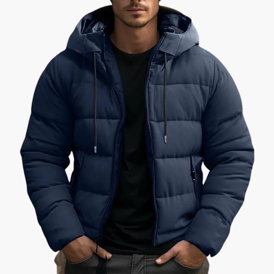 Man wearing a navy hooded puffer jacket