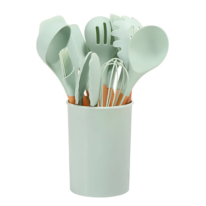 Light green utensil set in a storage bucket