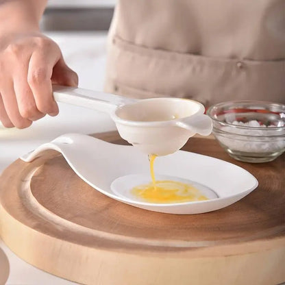 Egg separator being used over a plate
