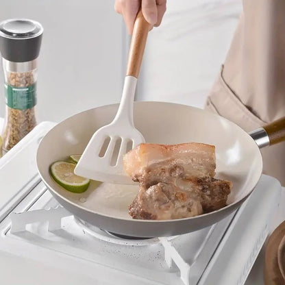 Silicone turner used in a non-stick pan