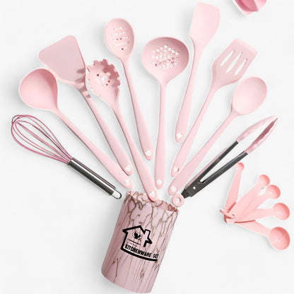 Black utensils laid out beside the bucket