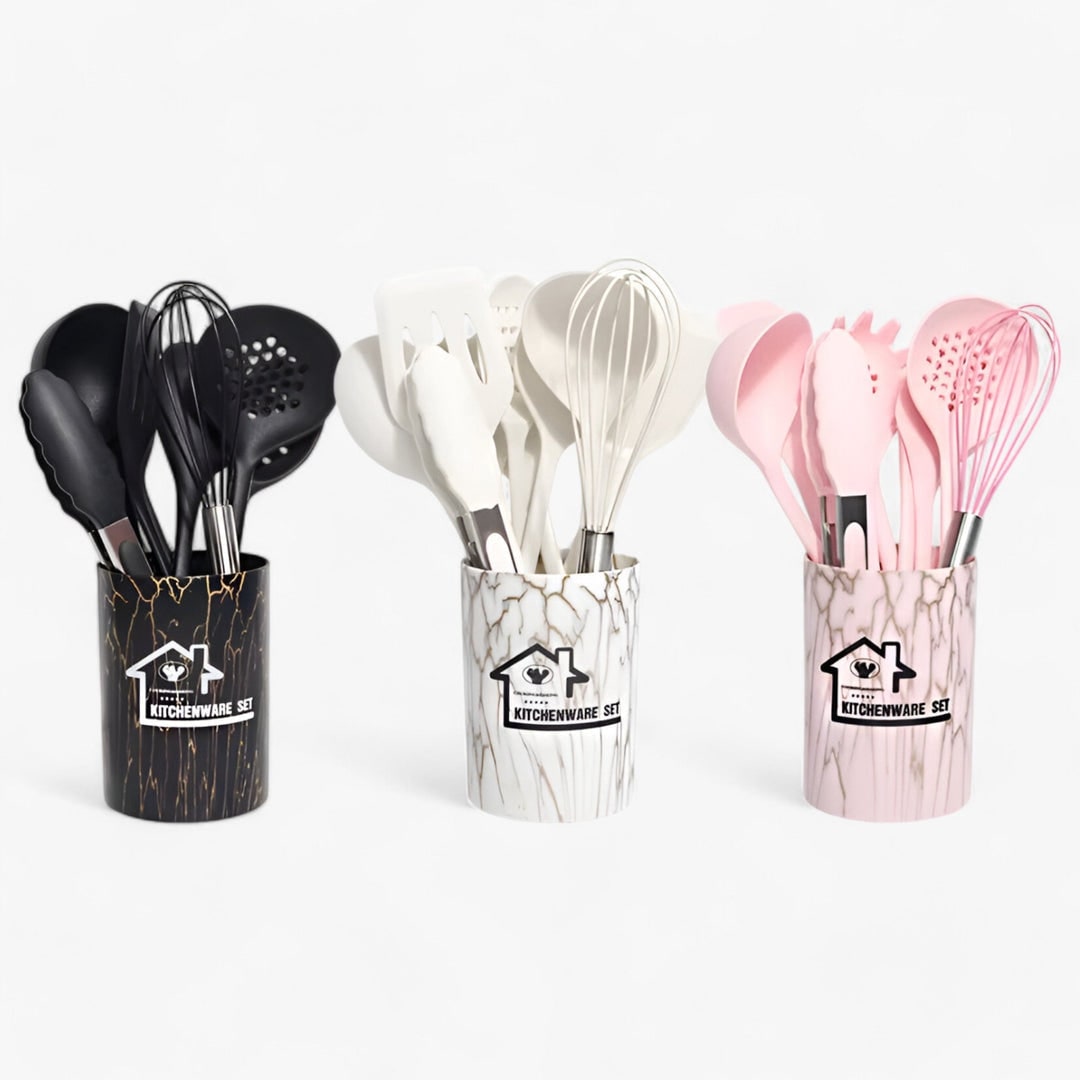 Pink utensils laid out beside the bucket