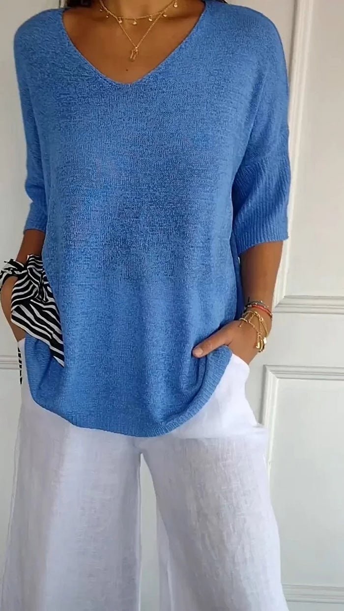 Women's blue V-neck knit sweater
