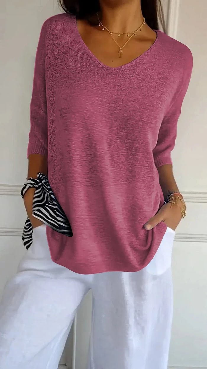 Women's pink V-neck knit sweater