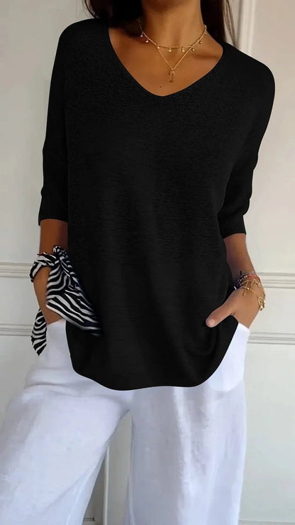 Women's black V-neck knit sweater