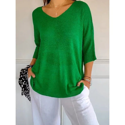 Women's green V-neck knit sweater