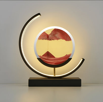 Sand art lamp with red sand, light switched on