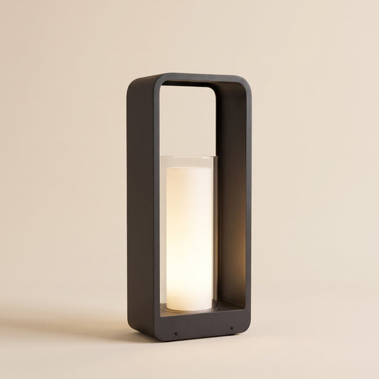 Black aluminium solar lantern with a glowing frosted cylinder