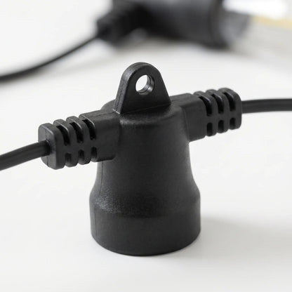 Close up of the black socket with hanging loop and ribbed grips