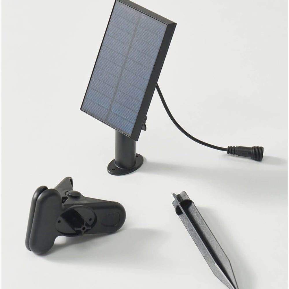 Solar panel on a ground stake with a mounting clip