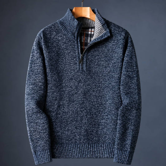Blue knit quarter zip sweater for men with a mock neck and plaid-lined collar