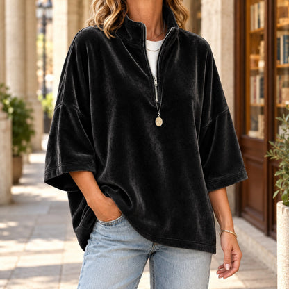 Women's black quarter zip sweater with a velvety finish