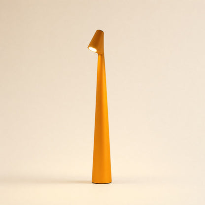 Slim cordless LED table lamp with tilted head in orange