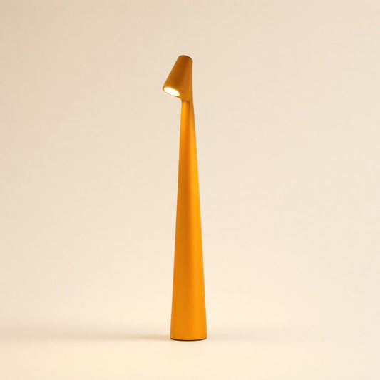 Slim cordless LED table lamp with tilted head in orange