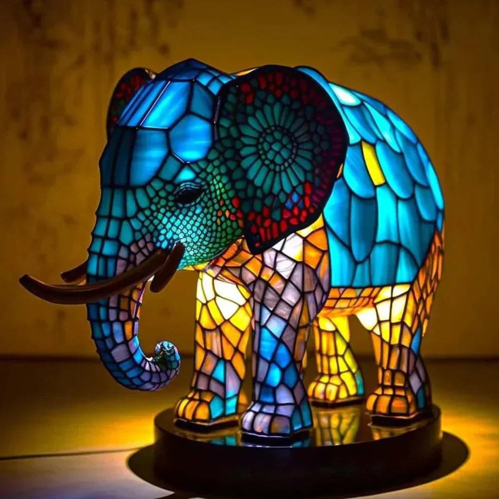 Stained glass elephant table lamp switched on