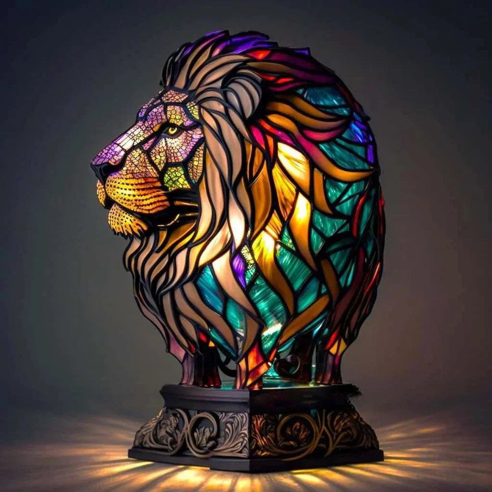 Stained glass lion table lamp switched on