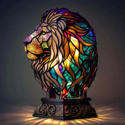 Stained glass lion table lamp switched on
