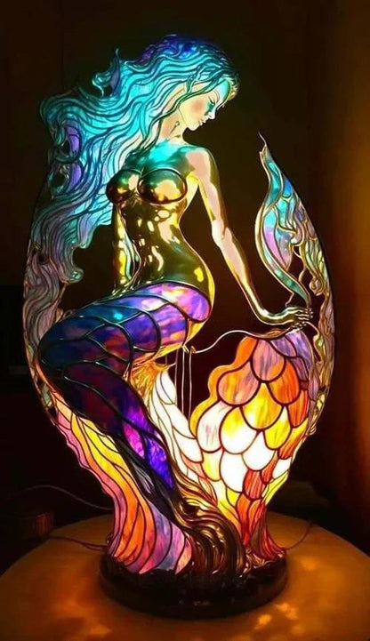 Stained glass mermaid table lamp switched on