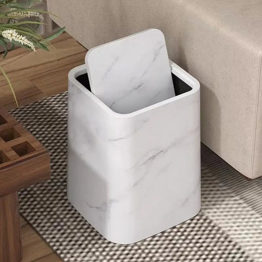 White marble look trash can with swing lid