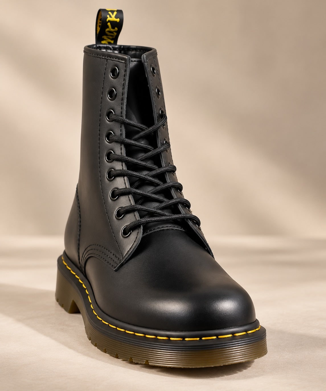 Black lace-up boot, front view