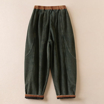 Forest green corduroy harem pants, side view