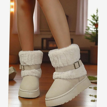 Beige snow boots worn indoors