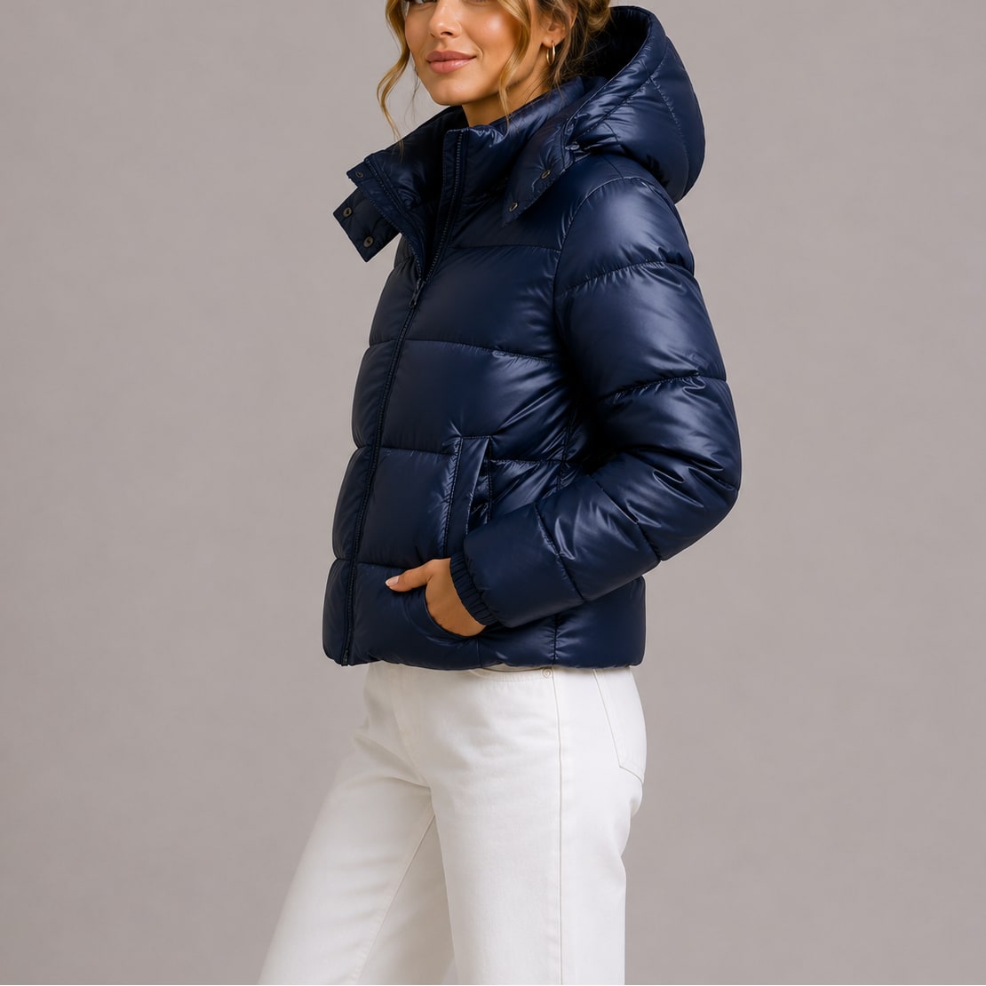 Navy hooded puffer jacket, side view