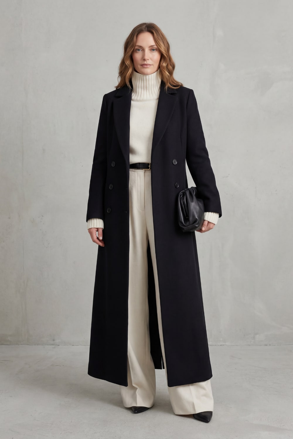 Black long tailored coat, front view