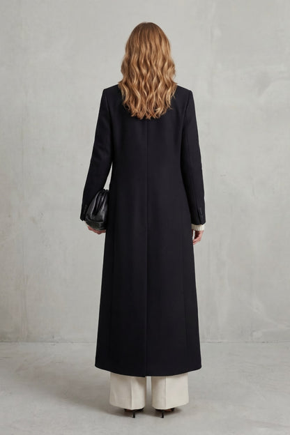 Black long tailored coat, back view