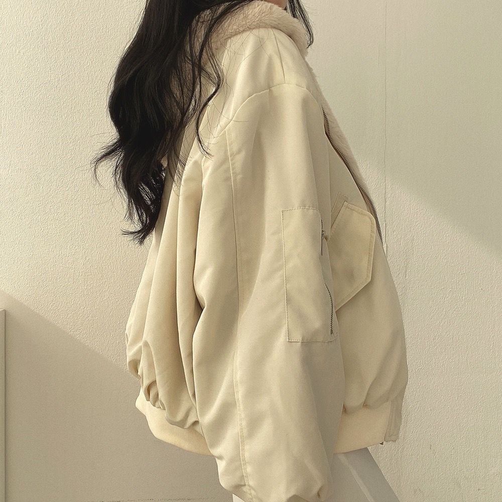 Beige jacket worn on the smooth side