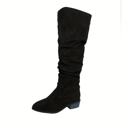 Black slip-on boot, side view