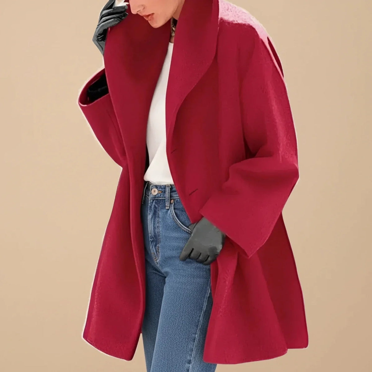 Woman wearing a red oversized A-line coat