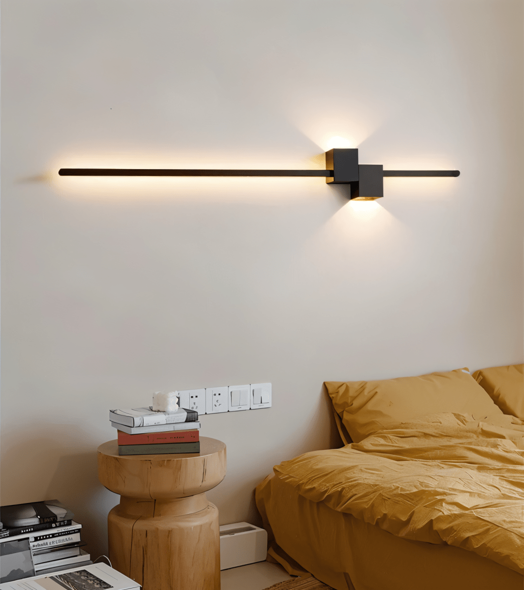 Close-up of the slim metal housing of the linear wall light