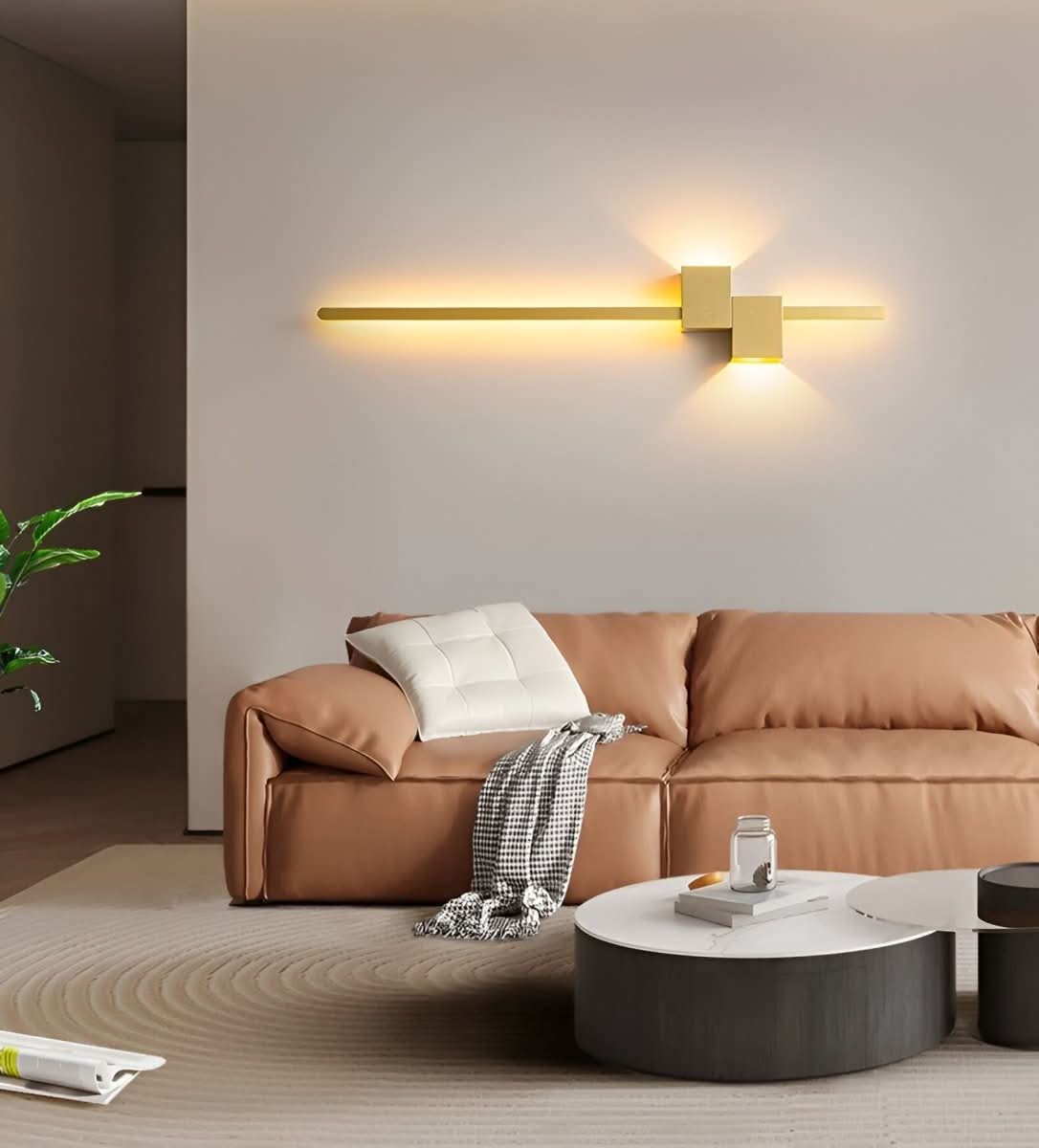 Slim linear LED wall light in gold