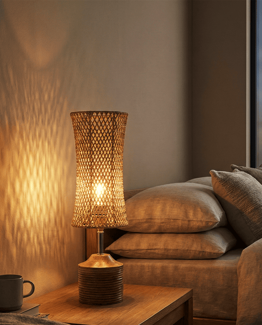 Woven fibre table lamp with a wood-effect base, front view
